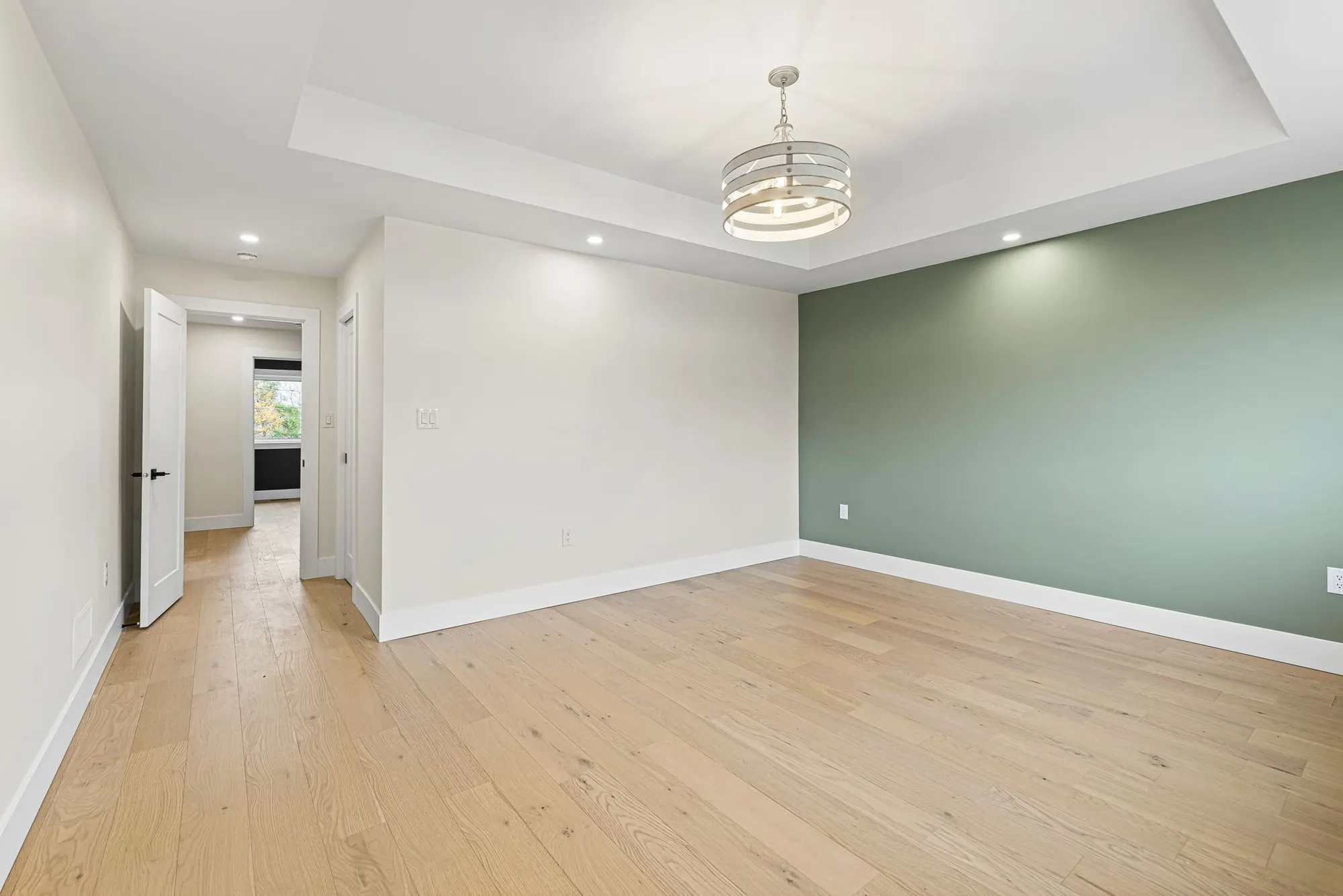 Our in house designer chose to make pops of color throughout the home with simple feature accent walls.