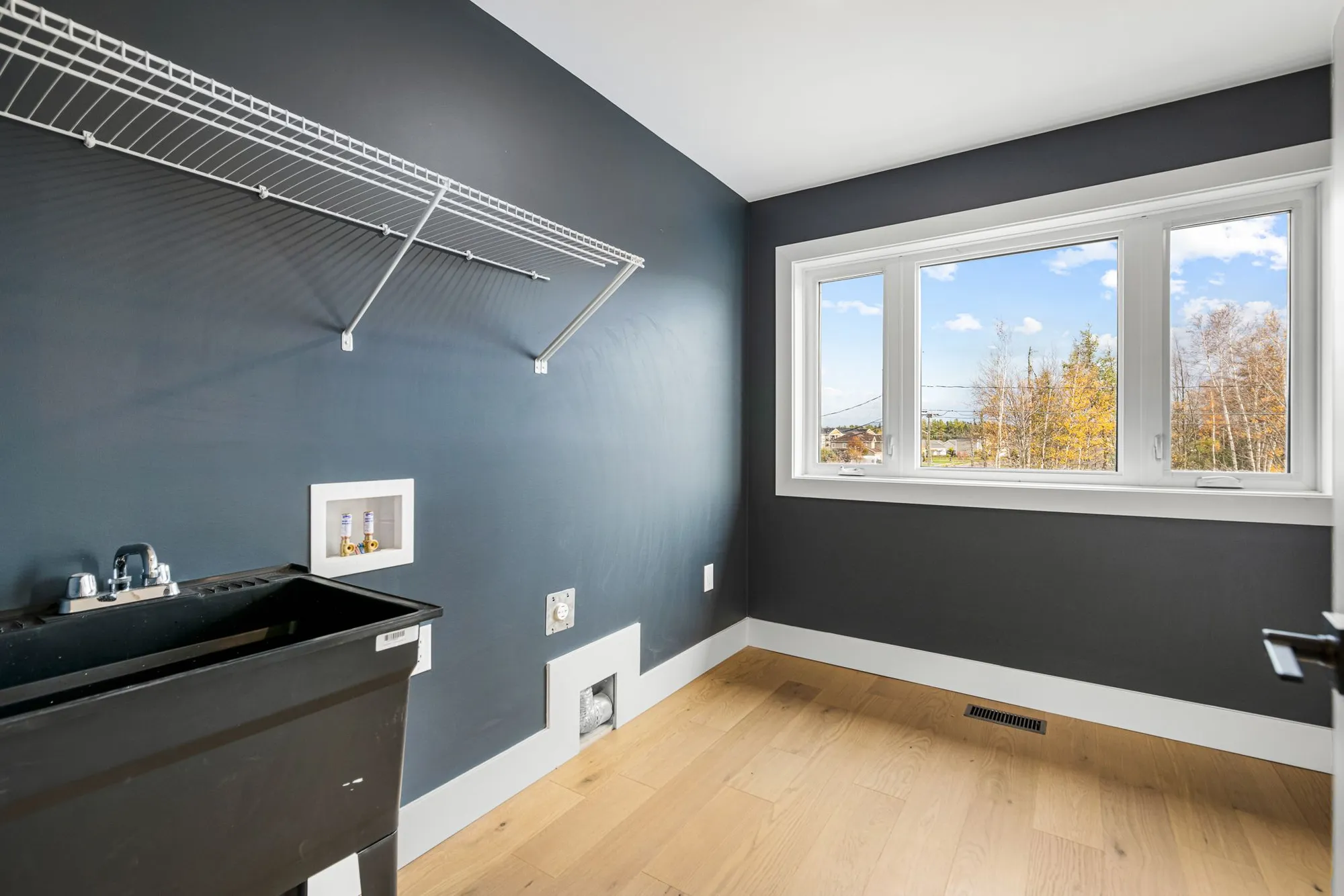 Custom stairs open to the main level.